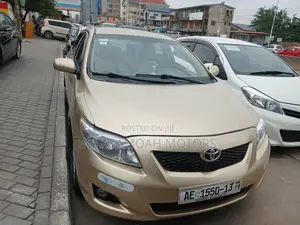 Toyota Corolla Base 4dr Sedan (1.8L 4cyl 5M) 2010 Gold