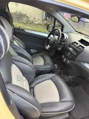 Chevrolet Spark 1LT 4dr Hatchback (1.2L 4cyl CVT) 2014 Yellow