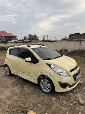 Chevrolet Spark 1LT 4dr Hatchback (1.2L 4cyl CVT) 2014 Yellow