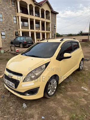 Chevrolet Spark 1LT 4dr Hatchback (1.2L 4cyl CVT) 2014 Yellow