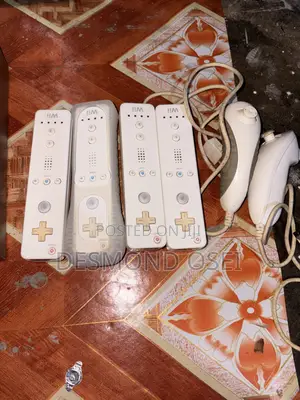 Nintendo Wii With 4 Controllers and 2 Joysticks