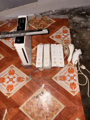 Nintendo Wii With 4 Controllers and 2 Joysticks