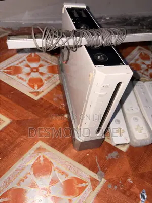 Nintendo Wii With 4 Controllers and 2 Joysticks
