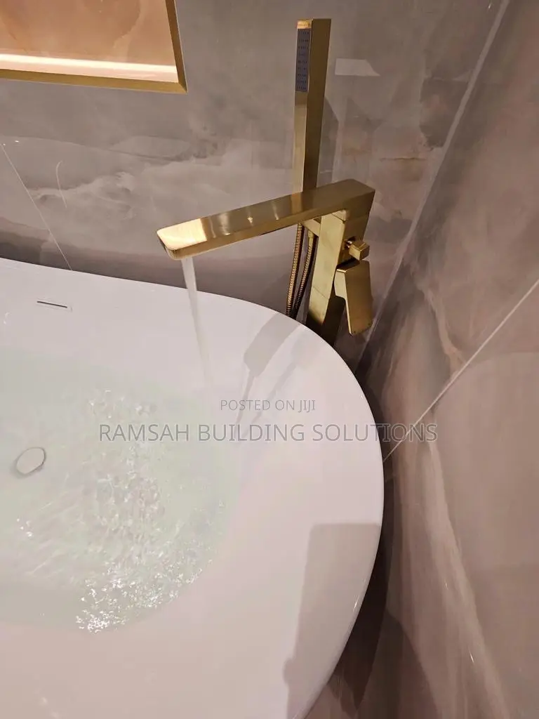 Luxury Freestanding Bathtub With Gold Mixer