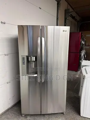 Lg Side-by-Side Refrigerator ( Home Used- Almost New) Capacity: