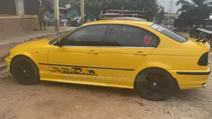 BMW 3 Series 318i RWD 2000 Yellow
