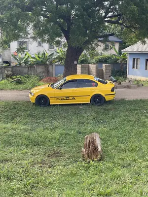 BMW 3 Series 318i RWD 2000 Yellow