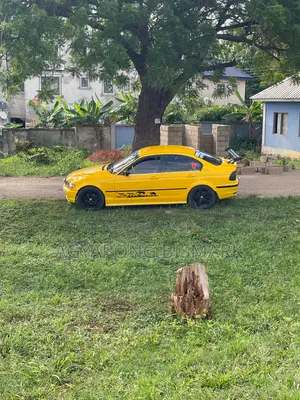BMW 3 Series 318i RWD 2000 Yellow