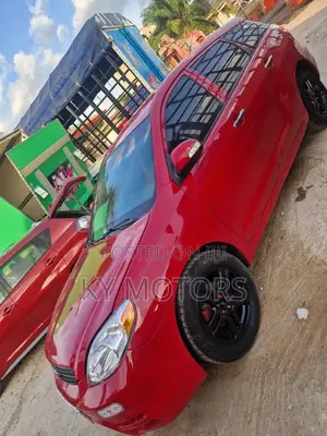 Toyota Matrix Hatchback AWD (1.8L 4cyl 4A) 2006 Red