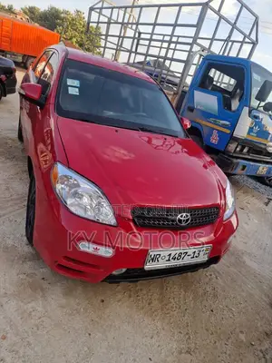 Toyota Matrix Hatchback AWD (1.8L 4cyl 4A) 2006 Red