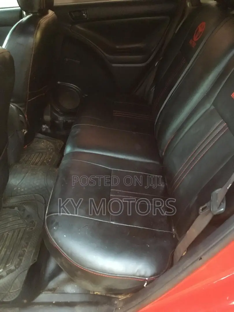Toyota Matrix Hatchback AWD (1.8L 4cyl 4A) 2006 Red