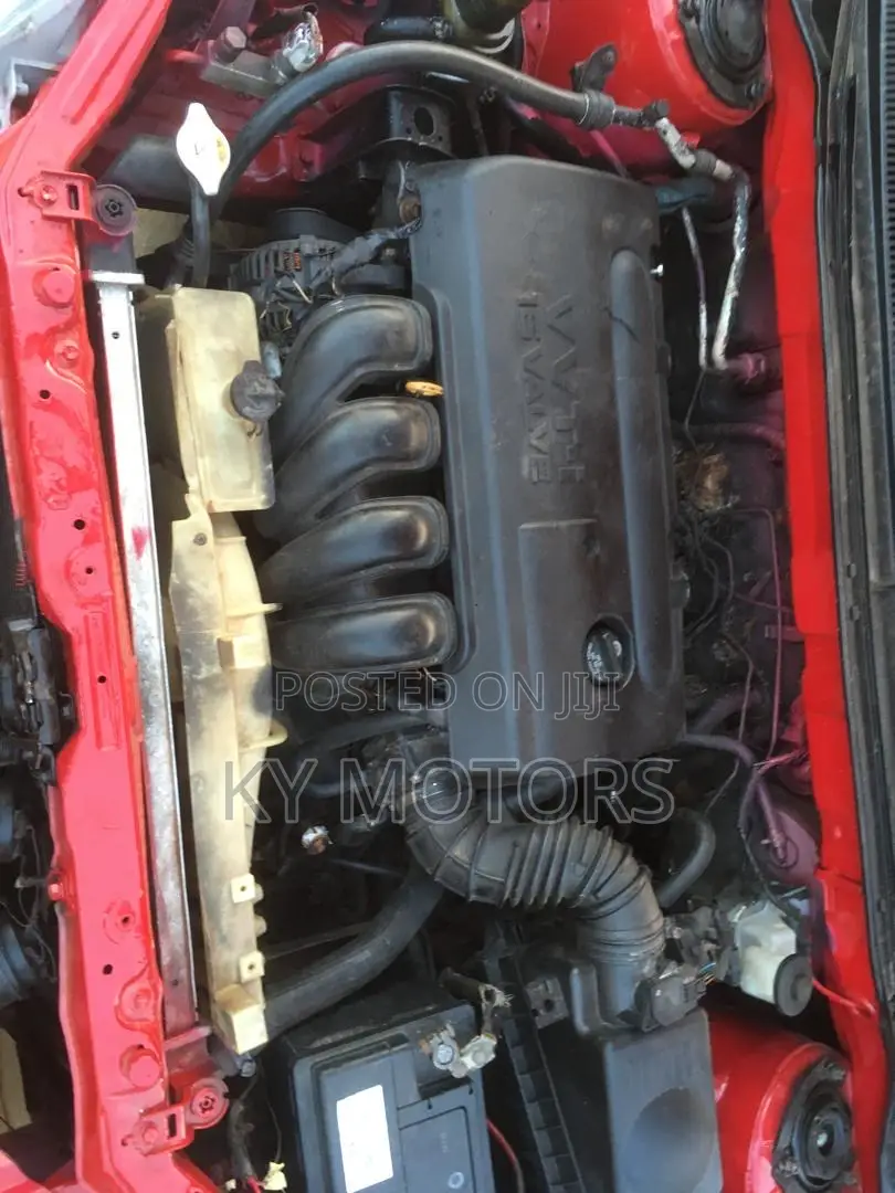 Toyota Matrix Hatchback AWD (1.8L 4cyl 4A) 2006 Red
