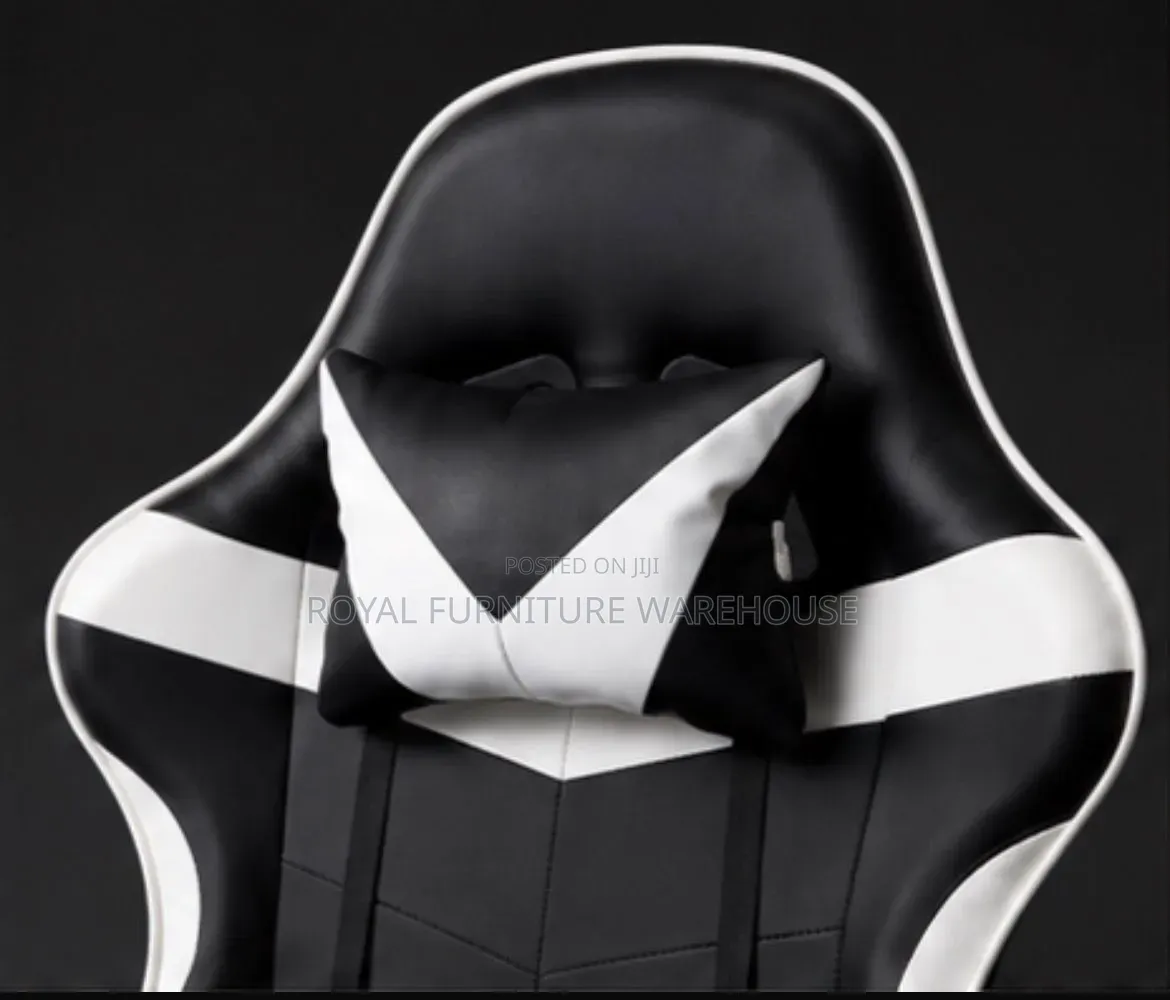Black/White Ergonomic Gaming Chair With Footrest and Headrest Pillow.