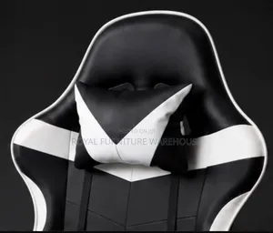 Black/White Ergonomic Gaming Chair With Footrest and Headrest Pillow.