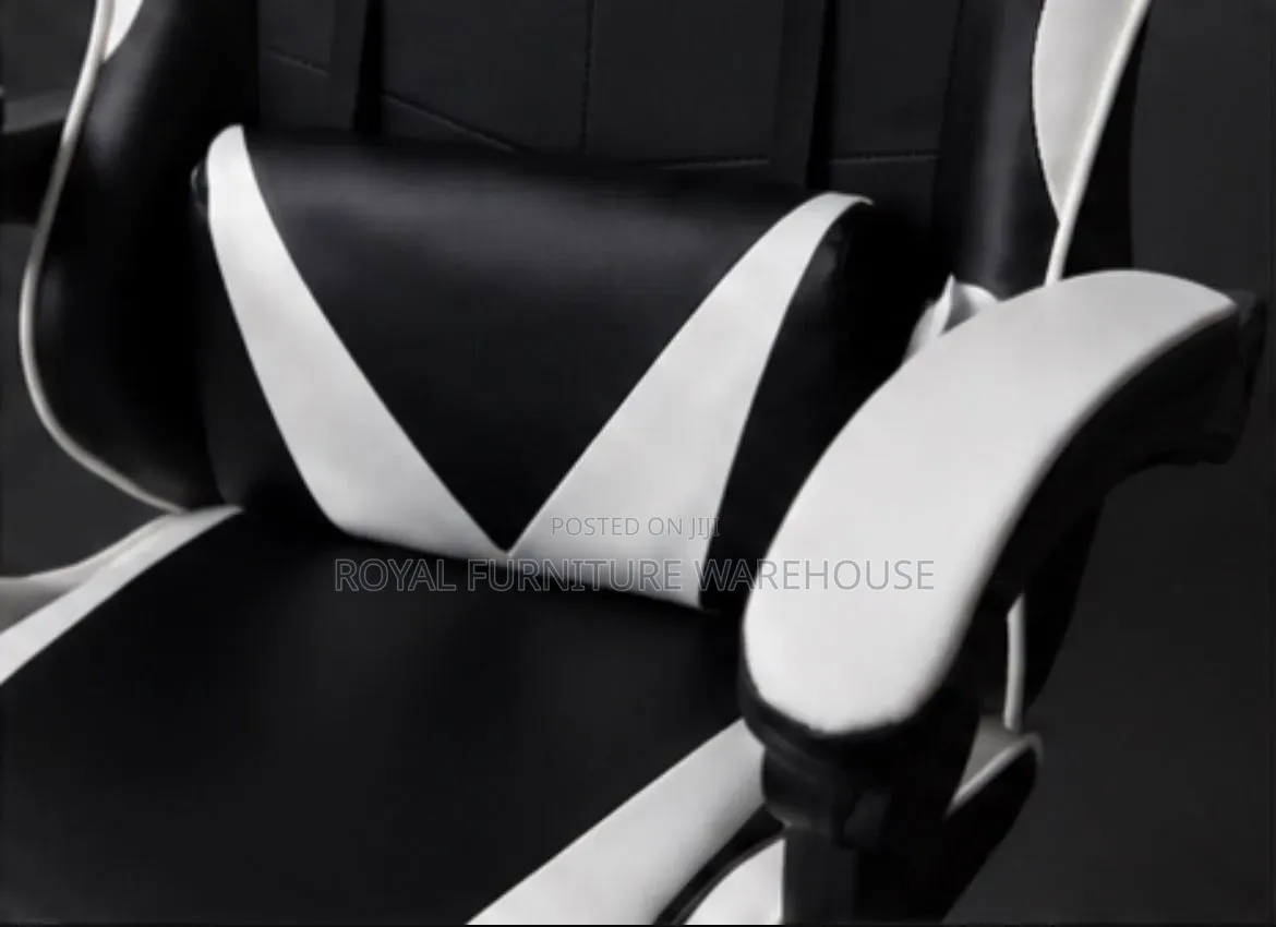 Black/White Ergonomic Gaming Chair With Footrest and Headrest Pillow.