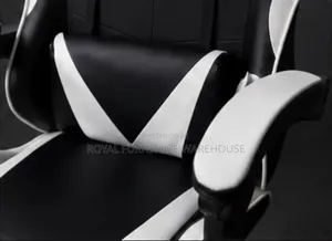 Black/White Ergonomic Gaming Chair With Footrest and Headrest Pillow.