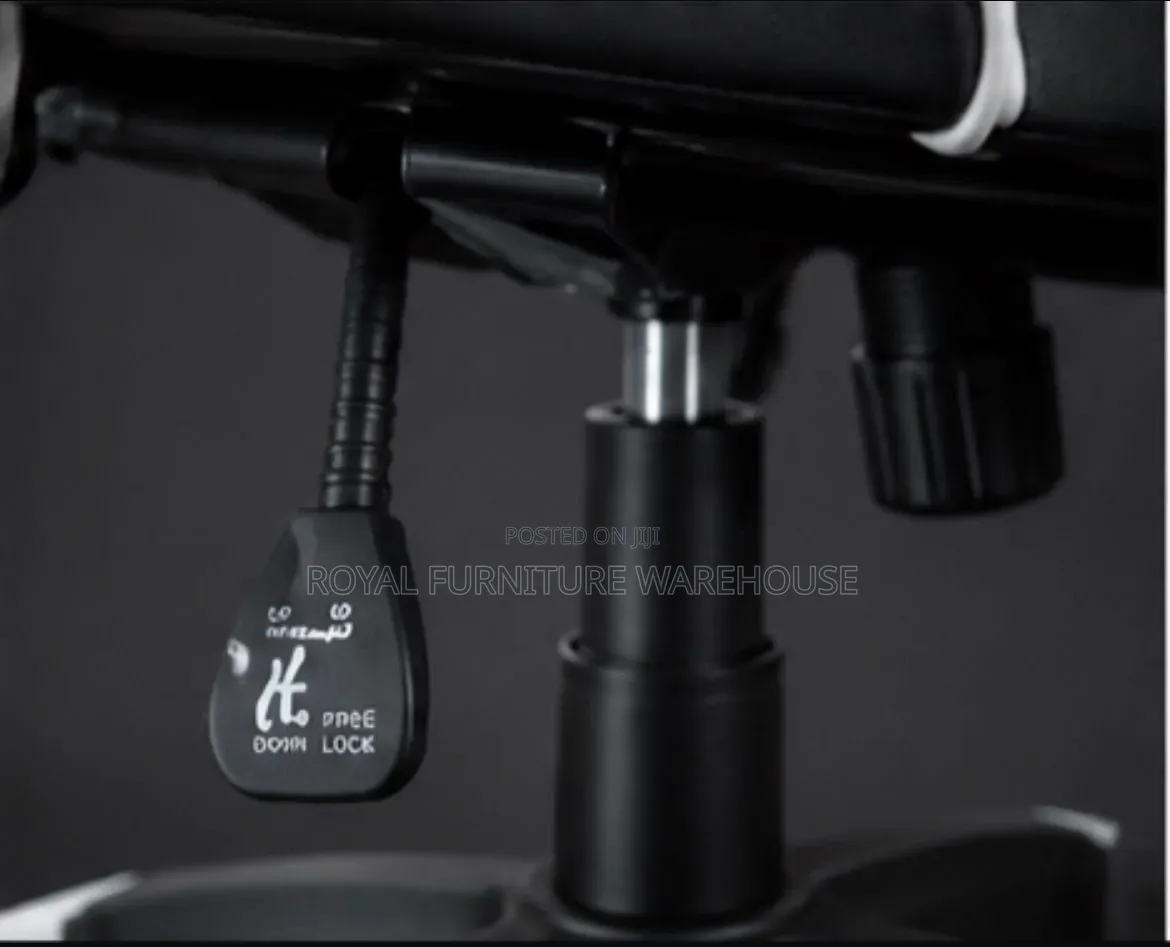 Black/White Ergonomic Gaming Chair With Footrest and Headrest Pillow.