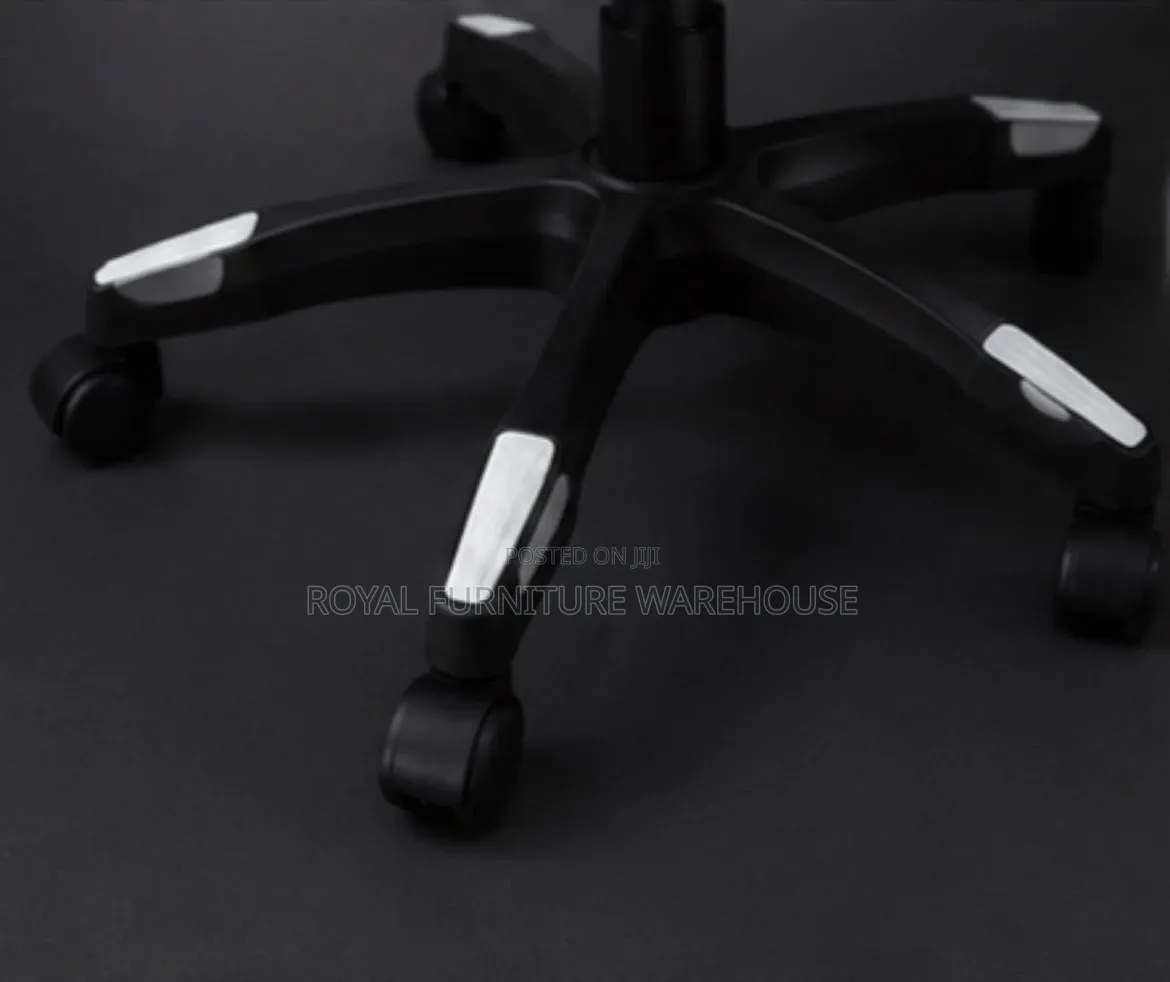 Black/White Ergonomic Gaming Chair With Footrest and Headrest Pillow.