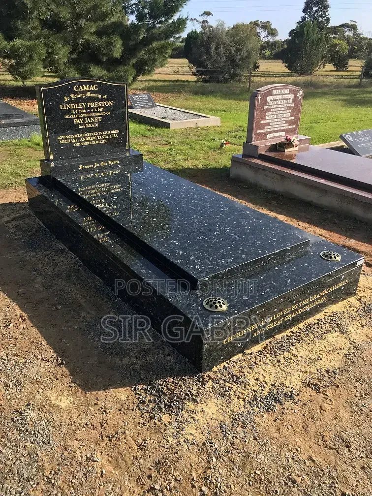 Cemetery Tombstone And Granite Stone Grave