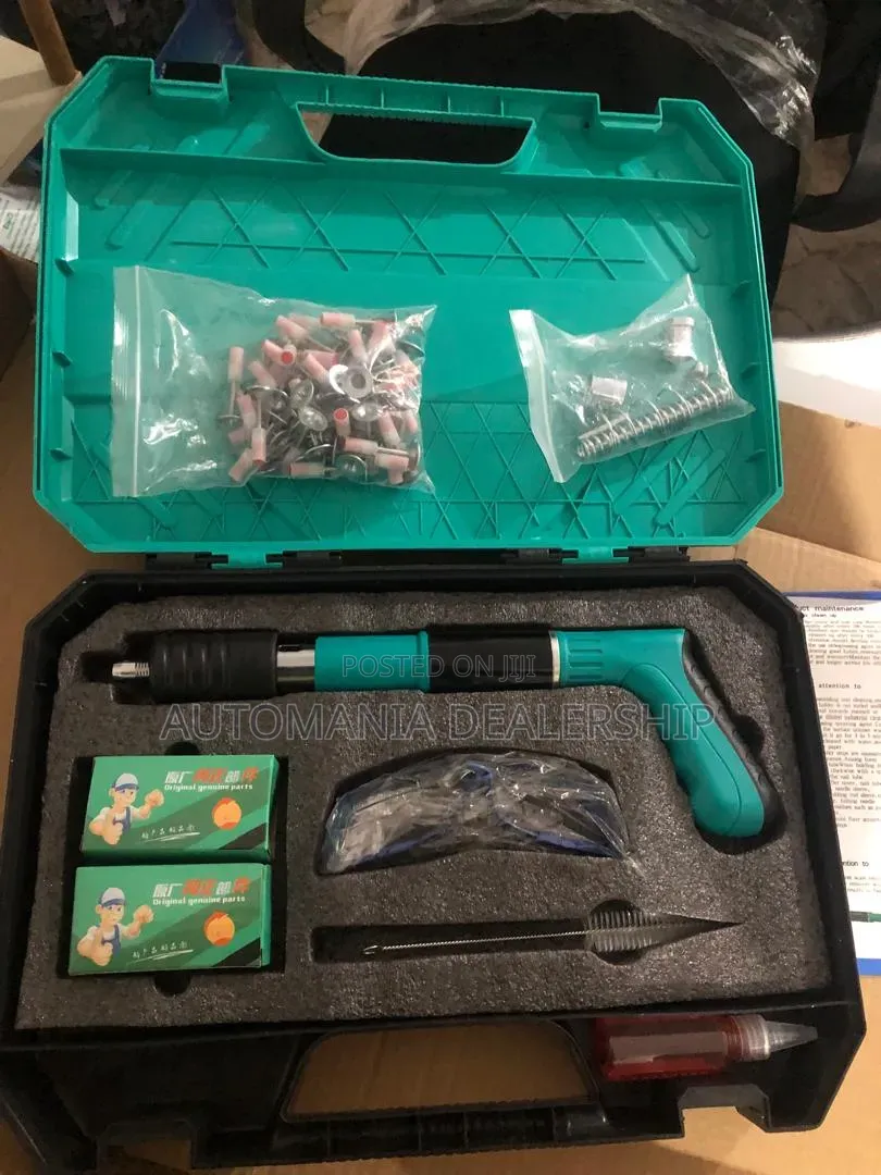 Nail Gun With Nails, Glasses and Fasteners