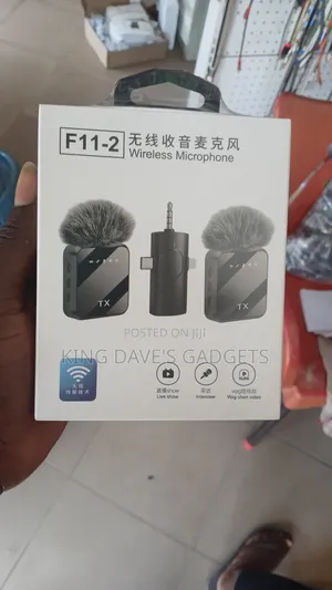 F11-2 Dual Wireless Lavalier Microphone With Interview Mic Stick Combo