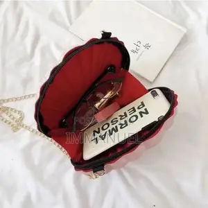 Shell-Shaped Glitter Clutch Bag