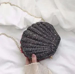 Shell-Shaped Glitter Clutch Bag
