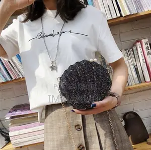 Shell-Shaped Glitter Clutch Bag