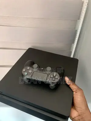 Ps4 Slim Loaded With Fc 26, the Last of Us 2, God of War Ragnarok Etc
