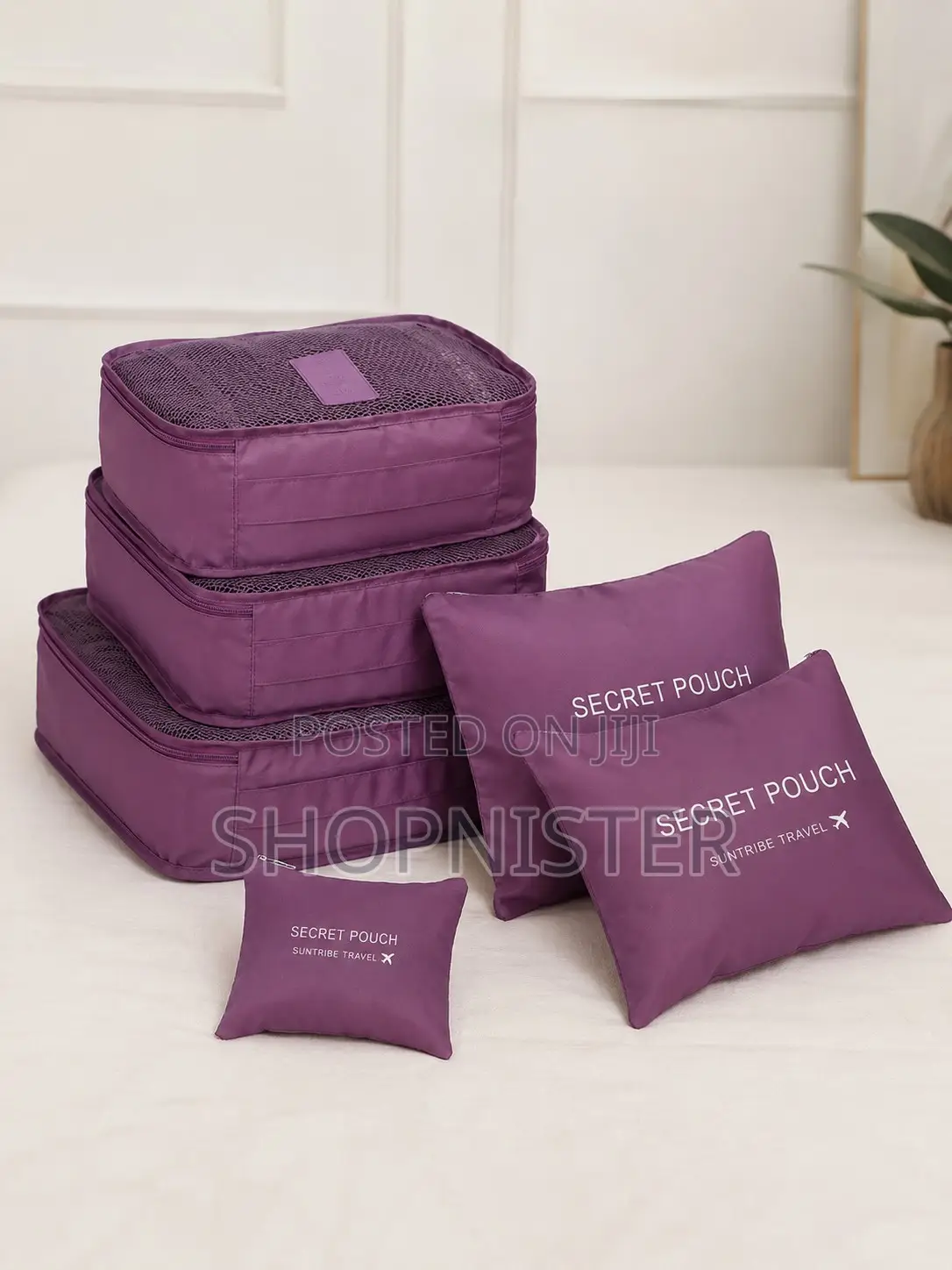 Packing Essentials on a Minimalist Bed