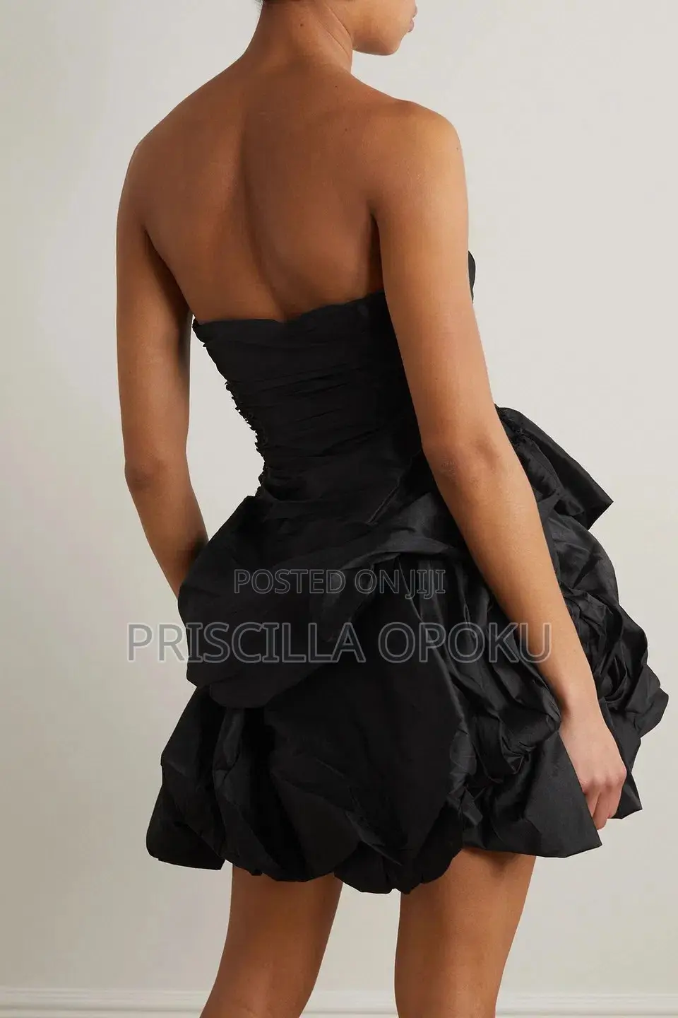 Mini Dress Features a Distinctive Tiered Ra-Ra Skirt A