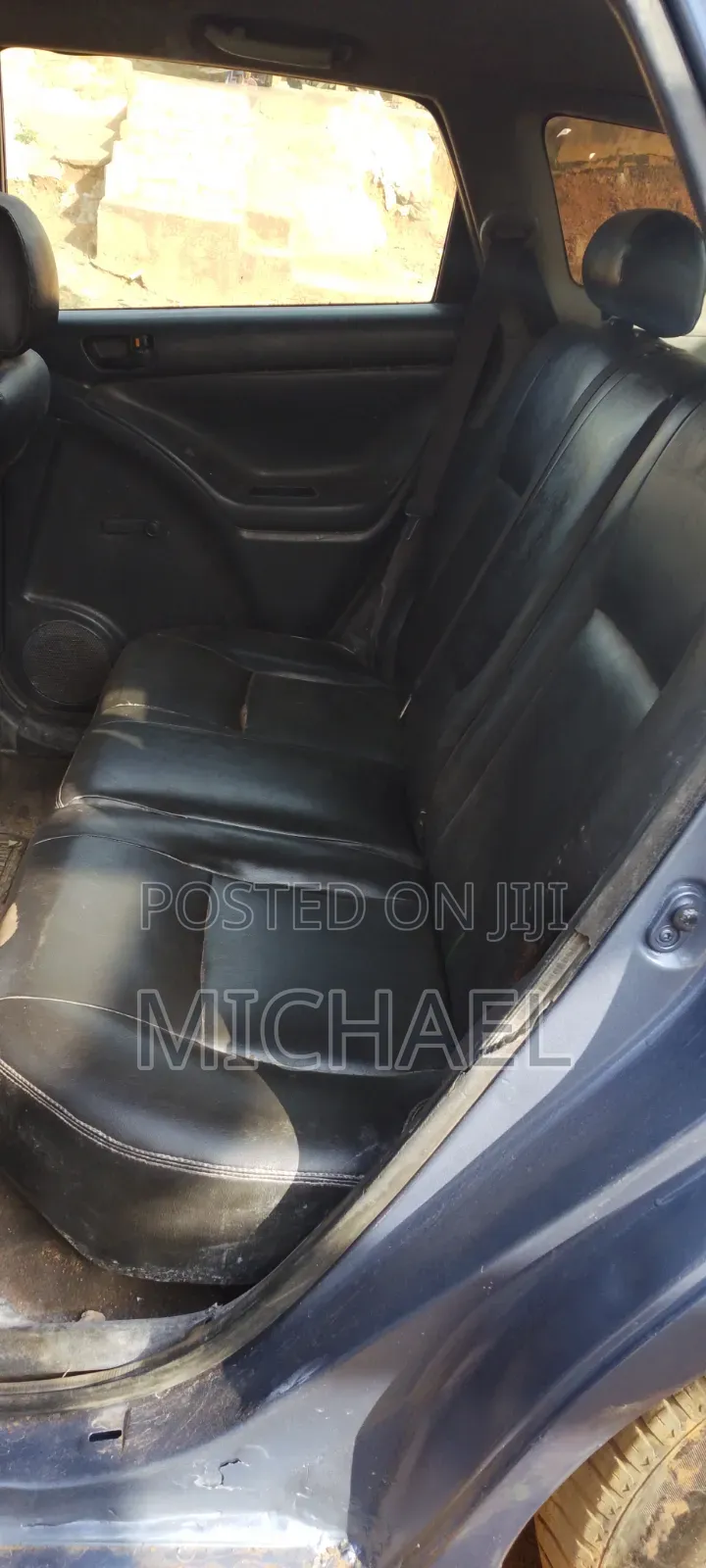 Toyota Matrix Hatchback AWD (1.8L 4cyl 4A) 2006 Blue