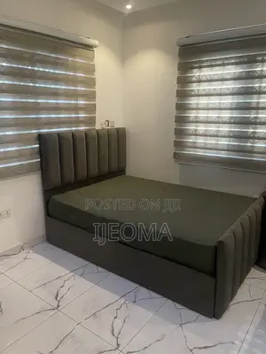 Bed Frame and Center Rug