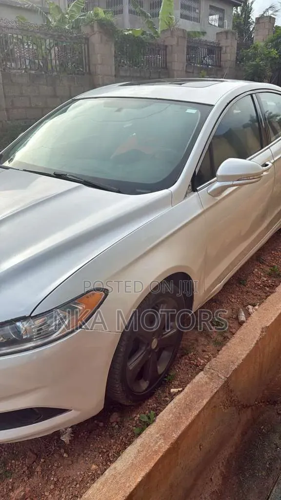 Ford Fusion Titanium 4dr Sedan w/EcoBoost (2.0L 4cyl Turbo 6A) 2014