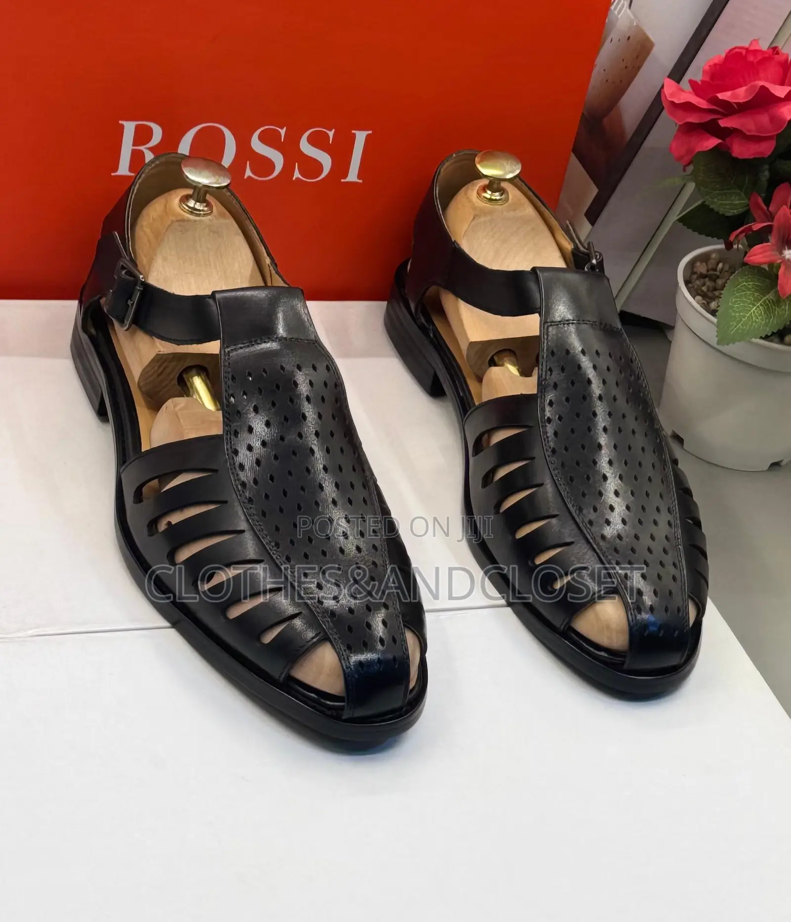 Black Leather Sandals Feature a T-Strap Design