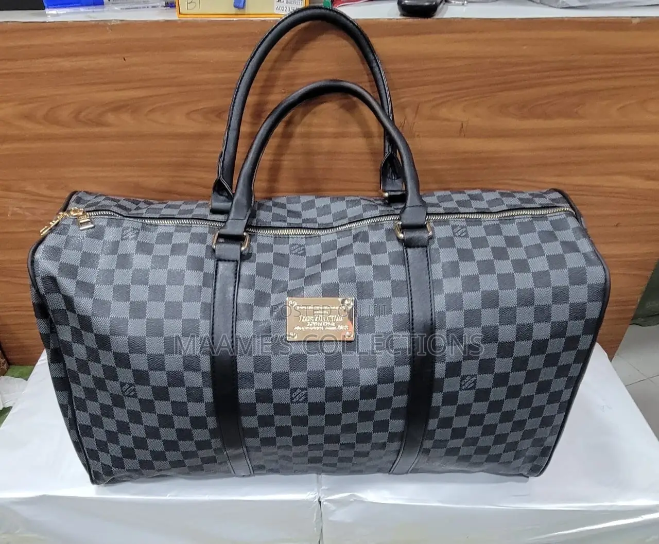 Louis Vuitton Keepall Bandoulière Duffle Bag.