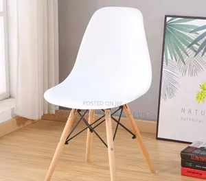 White Eames-Style Dining Chair With Wooden Legs