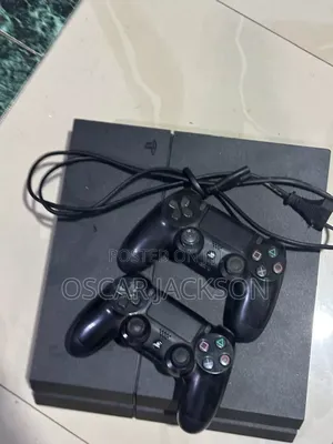 Playstation 4 Standard With Two Controllers and a Cd Game