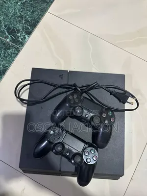 Playstation 4 Standard With Two Controllers and a Cd Game