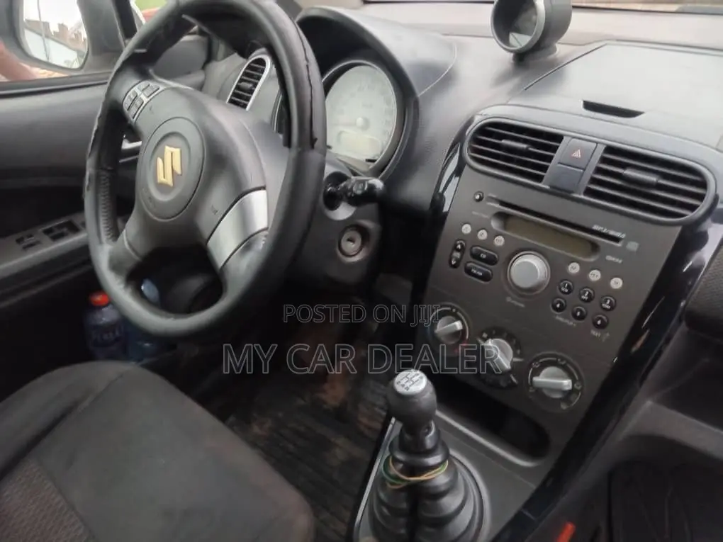 Suzuki Splash 2011 White