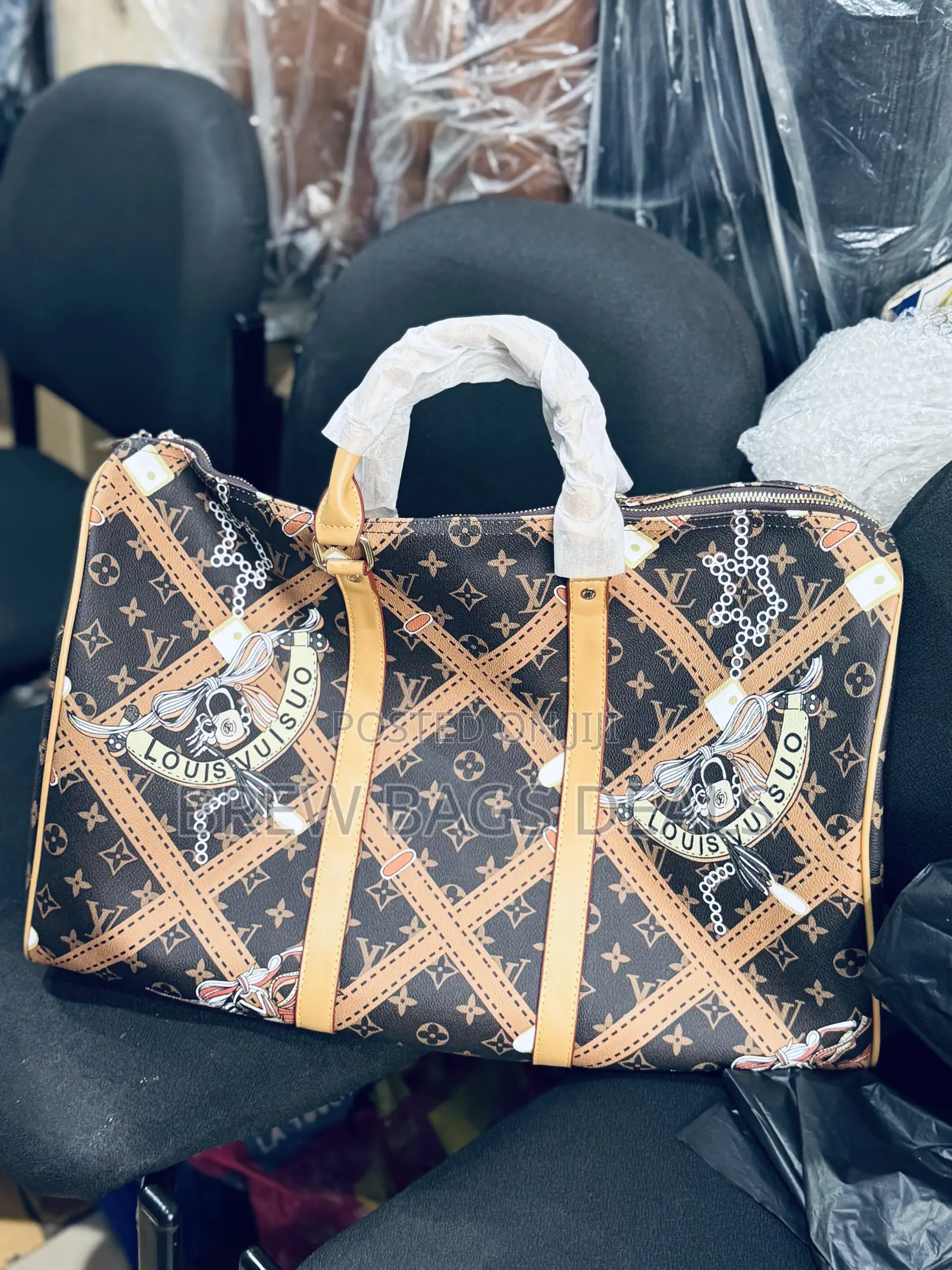 Premium Leather Louis Vuitton Duffle Traveling Bag.