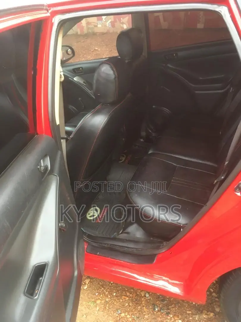 Toyota Matrix Hatchback AWD (1.8L 4cyl 4A) 2006 Red