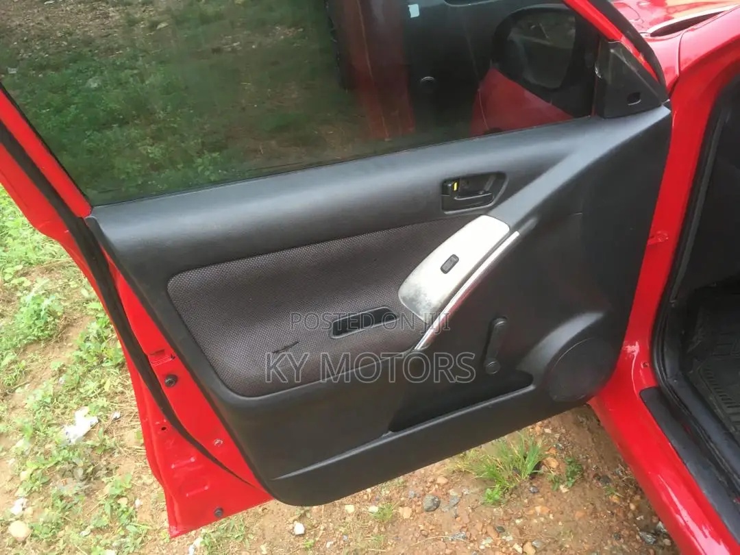 Toyota Matrix Hatchback AWD (1.8L 4cyl 4A) 2006 Red