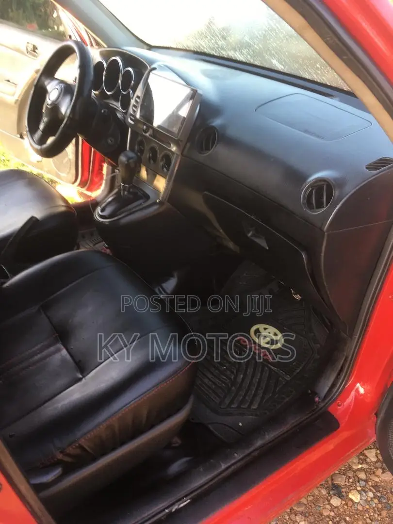 Toyota Matrix Hatchback AWD (1.8L 4cyl 4A) 2006 Red