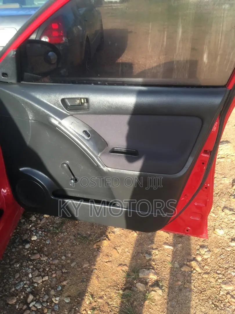 Toyota Matrix Hatchback AWD (1.8L 4cyl 4A) 2006 Red