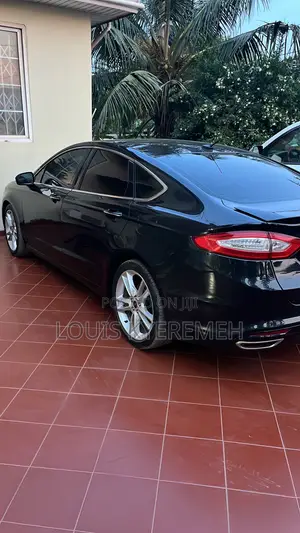Ford Fusion Titanium 4dr Sedan AWD w/EcoBoost (2.0L 4cyl Turbo 6A) 2014