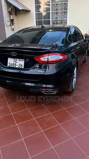 Ford Fusion Titanium 4dr Sedan AWD w/EcoBoost (2.0L 4cyl Turbo 6A) 2014