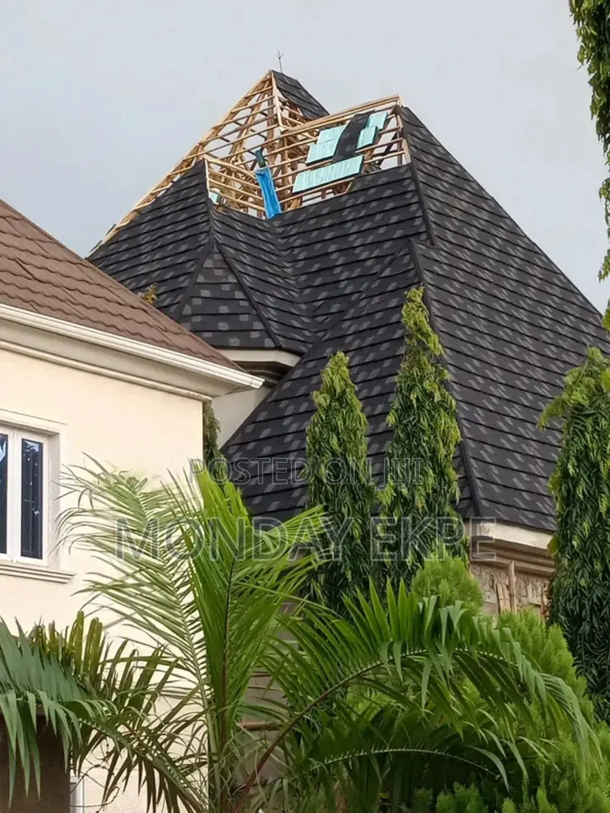 Black Bond Euro Tiles and Rain Gutter