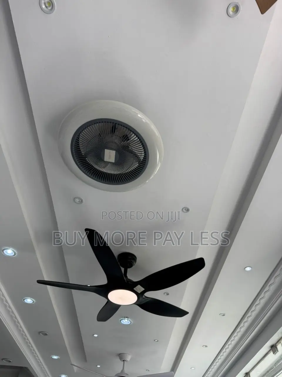 Matte Black 5-Blade Ceiling Fan With an Integrated Led Light Kit.