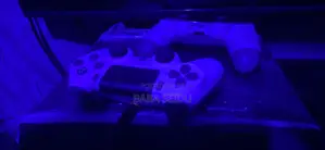 Ps4 Very Neatly With 2 Pad and 5 Solid Games